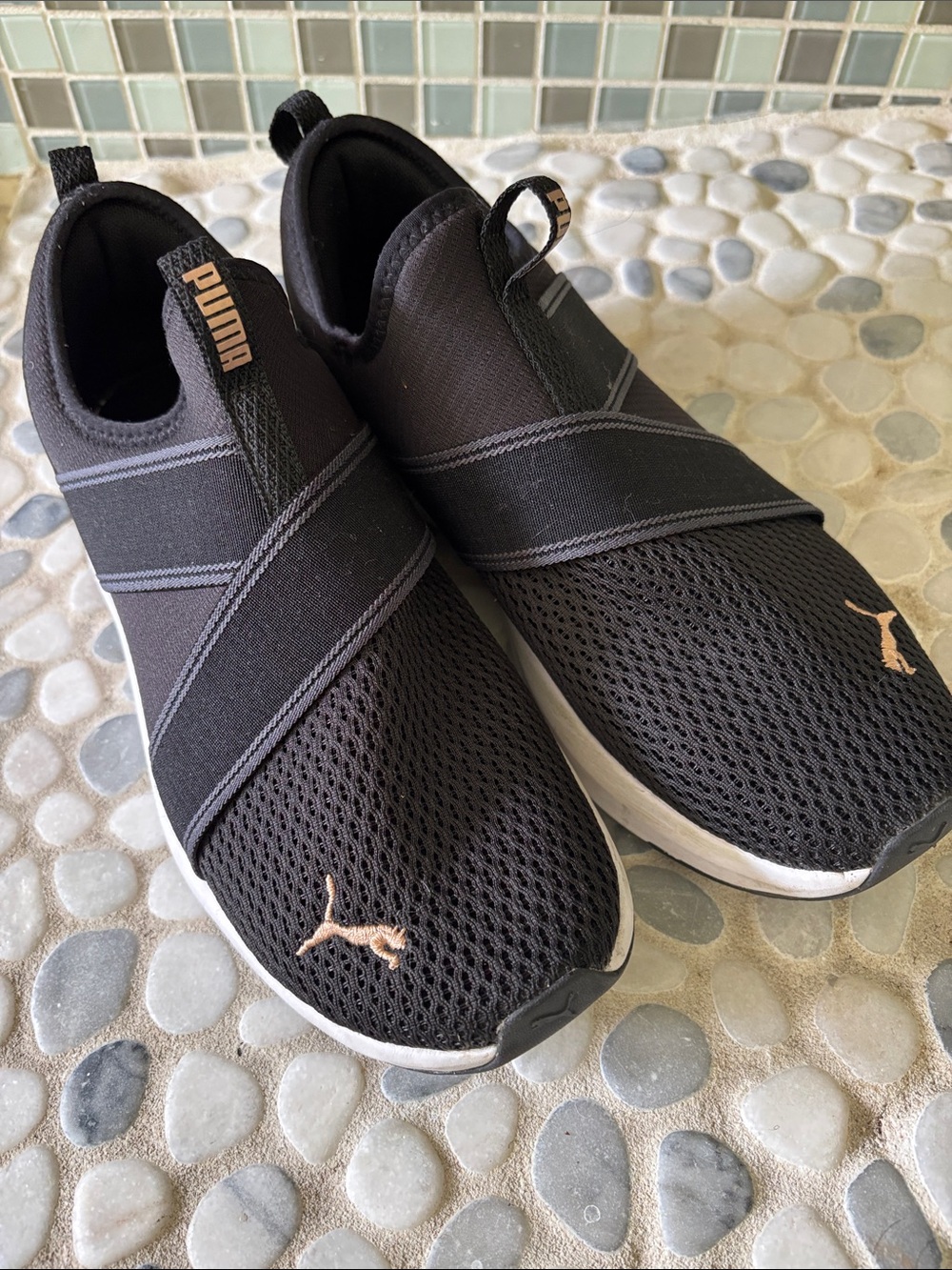 Puma Black Slip-On Sneakers with Rose Gold Logo Accents